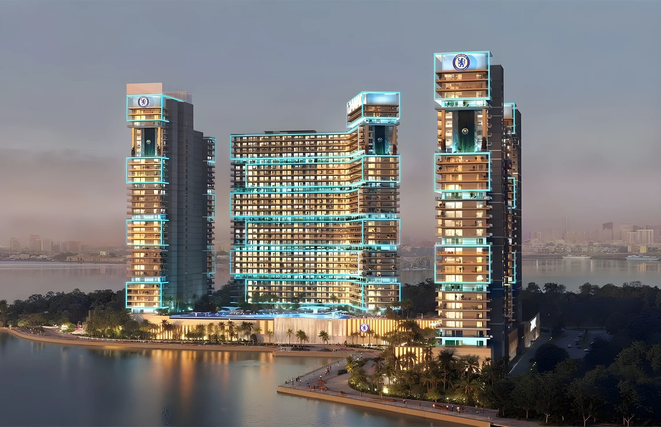 Chelsea Residences lit at dusk on the Dubai Maritime City waterfront
