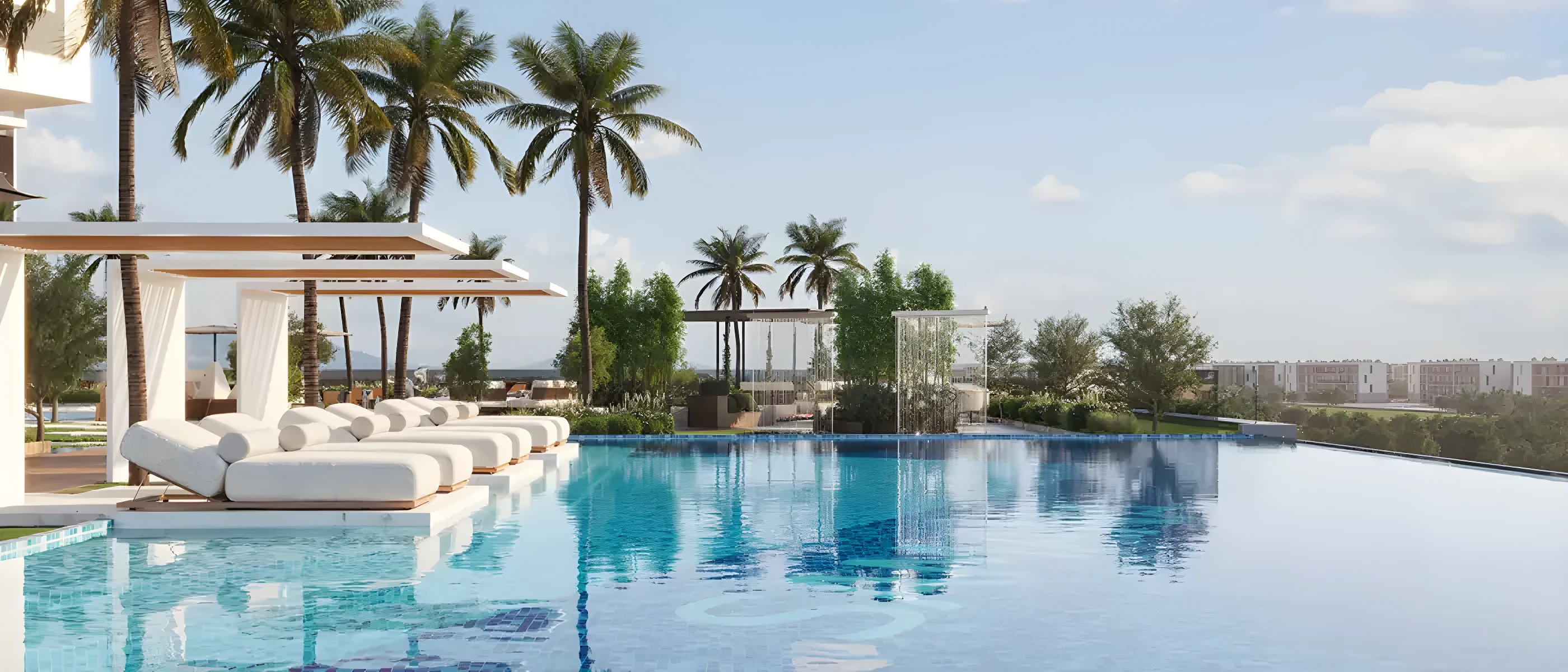 The lagoon pool and cabanas at Samana Barari Heights