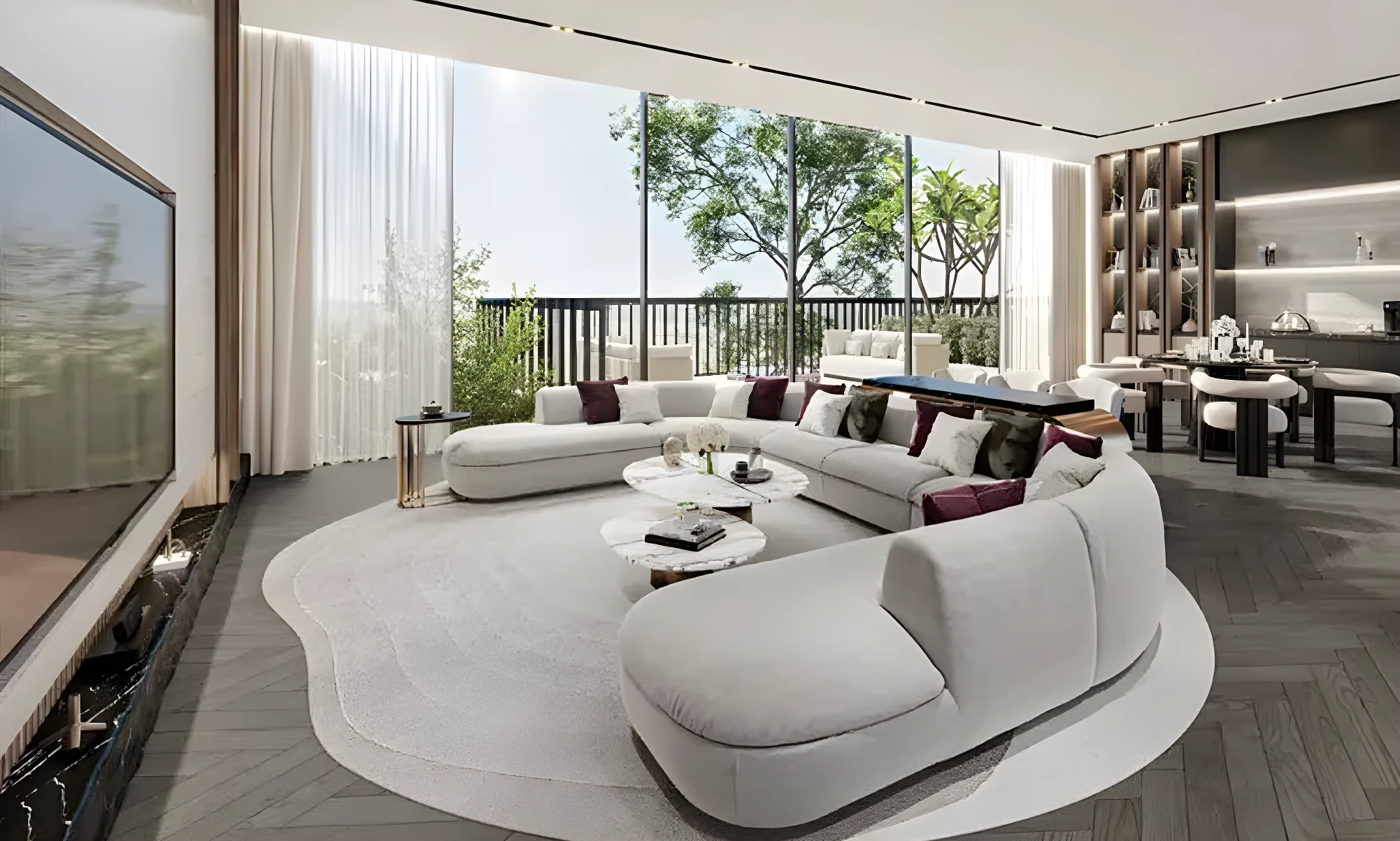 Living room in a Violet 4 townhouse with a curved sofa and full height glazing