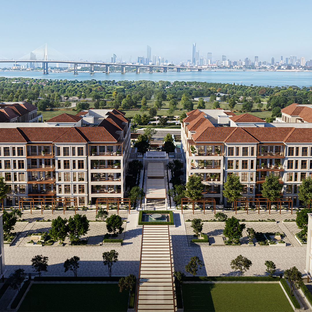 Hudayriyat Island Abu Dhabi — aerial view of Mediterranean villas with Abu Dhabi skyline